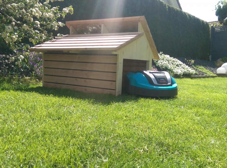 robot-lawn-mower-garage-wood